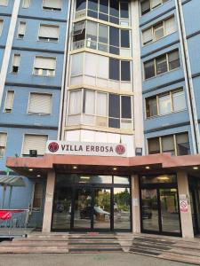 a building with a sign on the front of it at oasi di Villa Erbosa in Bologna