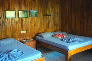 Letto o letti in una camera di Hotel Aurora