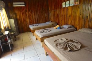 Letto o letti in una camera di Hotel Aurora