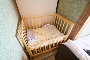 เตียงในห้องที่ Tomisato's House