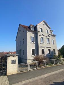a large house on the side of a road at Stadtgarten in Meißen