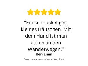 a screenshot of a cell phone with four stars at Stilvolles Design-Tiny-House mit Terrasse & Hund in Fuchsmühl +64 photos