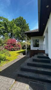 a set of stairs leading up to a house at Haus Sonnenschein in Bispingen
