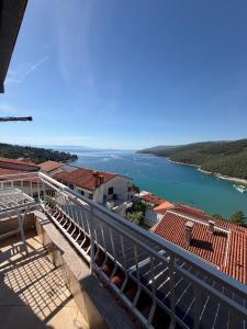 a view of a river from a balcony at Nela Apartment in Rabac