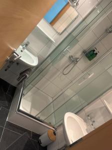a bathroom with a toilet and a sink at Bella Vista in See