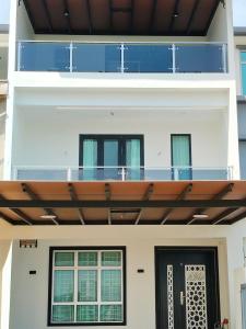 a view of the balcony of a house at 25 Homestay Pulai in Johor Bahru