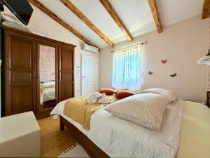 a bedroom with a bed and a window at Bed and Breakfast Casa Rustica in Vodnjan +80 photos