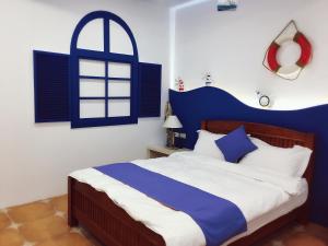 Letto o letti in una camera di Zi Jìng Fang Inn
