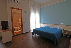Postel nebo postele na pokoji v ubytování Hotel Sayonara
