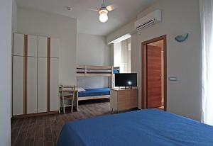 Postel nebo postele na pokoji v ubytování Hotel Sayonara
