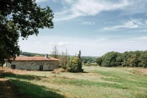 an old house in the middle of a field at Saint Germain - Logis de Beaulieu in Poullignac +6 photos