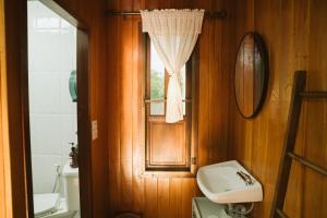 a bathroom with a sink and a window at Hindad Nature Resort in Ban Kui Mang +93 photos
