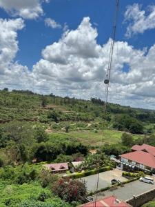 an overhead view of a house with a crane at SerenityLoft by Gloria in Thika