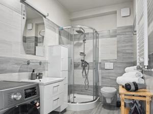 a bathroom with a shower and a toilet and a sink at Konstanzer Q - City Studio - Palas Mall - AC in Iaşi