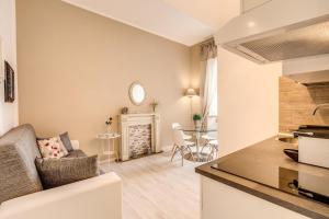 A kitchen or kitchenette at Vatican Miracle Suite