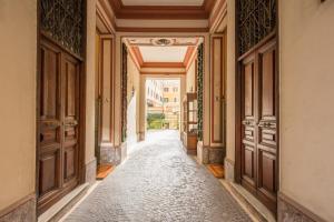 The facade or entrance of Vatican Miracle Suite