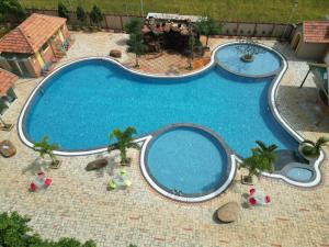an overhead view of two pools in a resort at Resotree in Talai