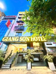 a building with a sign on the front of it at Giang Son Hanoi Hotel in Hanoi