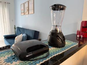 a blender sitting on top of a counter at Mar Azul Beach House in Cabo Frio