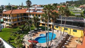 an aerial view of a resort with a swimming pool at Apartamentos Atlántico Resort in Montalvo
