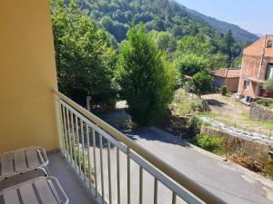 a balcony with a view of a mountain at Gerês maravilha in Geres