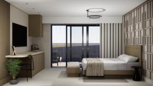 a bedroom with a bed and a desk and a television at Nerion Hotel & Spa in Agia Marina Nea Kydonias