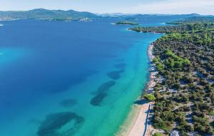 an aerial view of a beach and the ocean at Vecky in Jezera