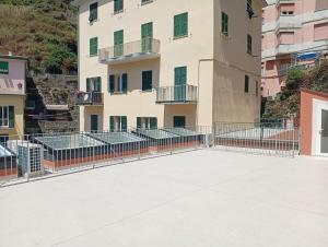 a large parking lot in front of a building at Il Sassolino in Riomaggiore