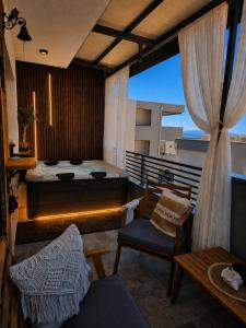 a room with a bed and a table and chairs at Johanan 2 in Makarska