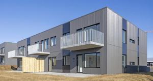 a building with balconies on the side of it at New Modern Two bedroom Apartment in Hveragerði