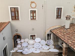 an overhead view of a table with plates on a balcony at Dimora Ferraris in Càbras +108 photos