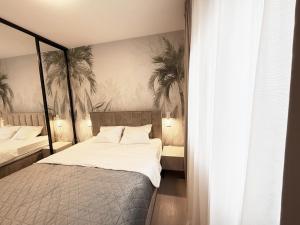 a bedroom with two beds with palm trees on the wall at Luxury Villa Rubi Vir - private pool in Vir +23 photos