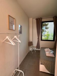 a bedroom with a bed and a window at Borgo&Lago Home in Castro