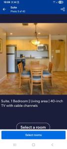a screenshot of a kitchen with a table and chairs at Dorado Del Mar Beach Resort in Dorado