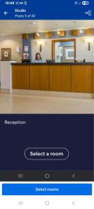 a person sitting at a counter in a room at Dorado Del Mar Beach Resort in Dorado +24 photos