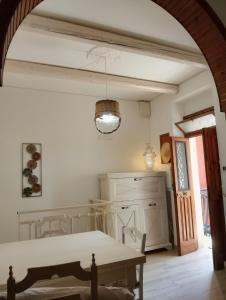 a room with a bed and a table at Dimora Egnazia in Savelletri di Fasano