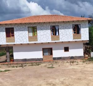 a house in a village in india at Oasis Campestre in Sáchica
