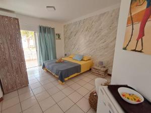 a bedroom with a bed in a room at Vilas Praia de Chaves SEA VIEW sol y mar in Rabil