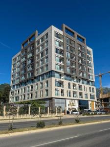 a tall building on the side of a street at JoHa Stay in Bar