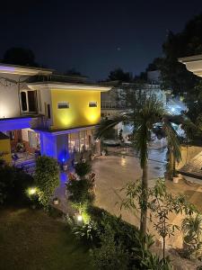 an aerial view of a building at night at The Exclusive House in Peshawar