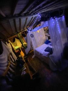 an overhead view of a room with a bed and lights at Bio Hotel - Eco Glamping El Refugio in Gigante