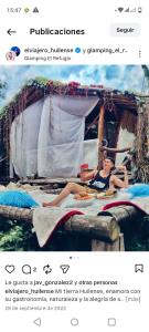 a picture of a woman laying on a bed at Bio Hotel - Eco Glamping El Refugio in Gigante