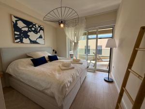 a bedroom with a large bed and a large window at Starview in Privlaka +21 photos