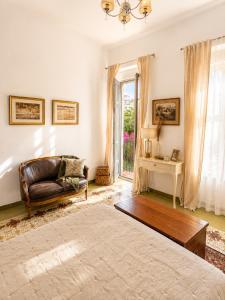 a living room with a bed and a couch at Van Gogh Luxury Flat By CH Luxury Apartments in Alicante