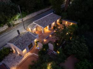 an overhead view of a house with lights at Aritis 3 in Corfu