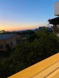 a view of the sunset from a house at Studio DKMK in Malia