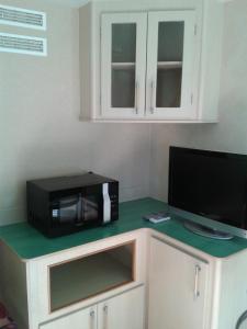 Kuchyň nebo kuchyňský kout v ubytování Mobile Homes Vila Punta