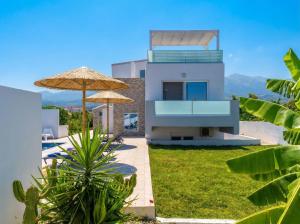 a villa with a view of the house at Lilu Villa 1 with Private Pool and Seaview in Tigaki