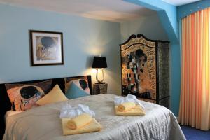 Postel nebo postele na pokoji v ubytování Hotel Fröbelhof