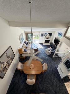 an overhead view of a living room with a table and chairs at Coastal Comfort in Oxnard